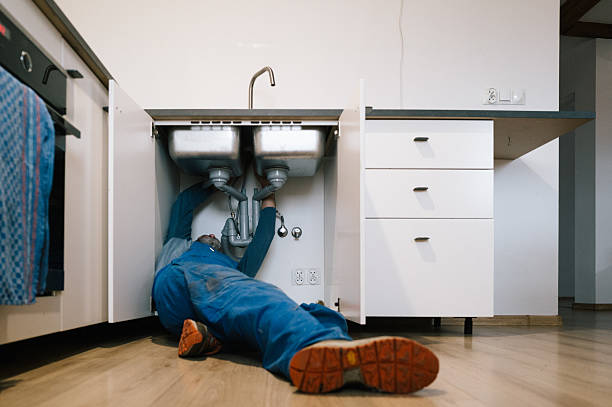 Professional Drain Cleaning technician working in Sparta, MI
